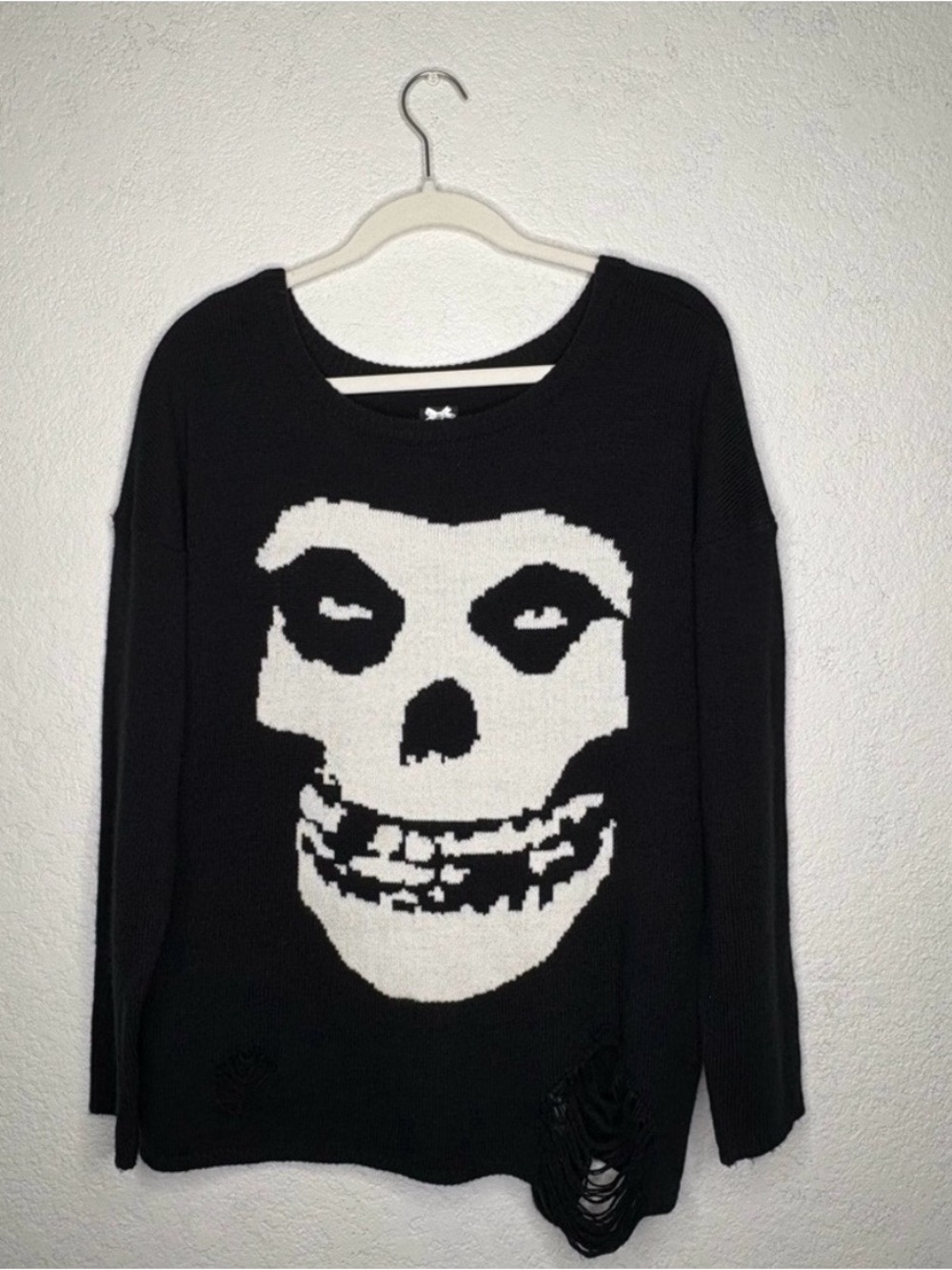Black Knit Sweater with White Skull Graphic